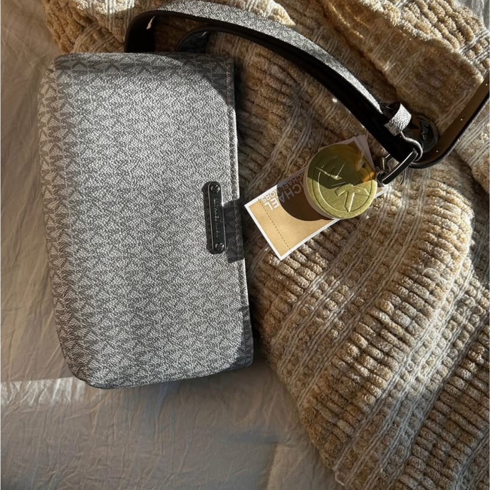 Michael Kors Silver Belt Bag with Structured Design